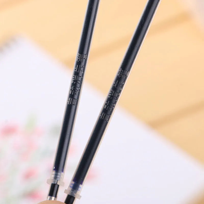 Automatic fade and disappear pen set showing pen holder and refills for temporary marking