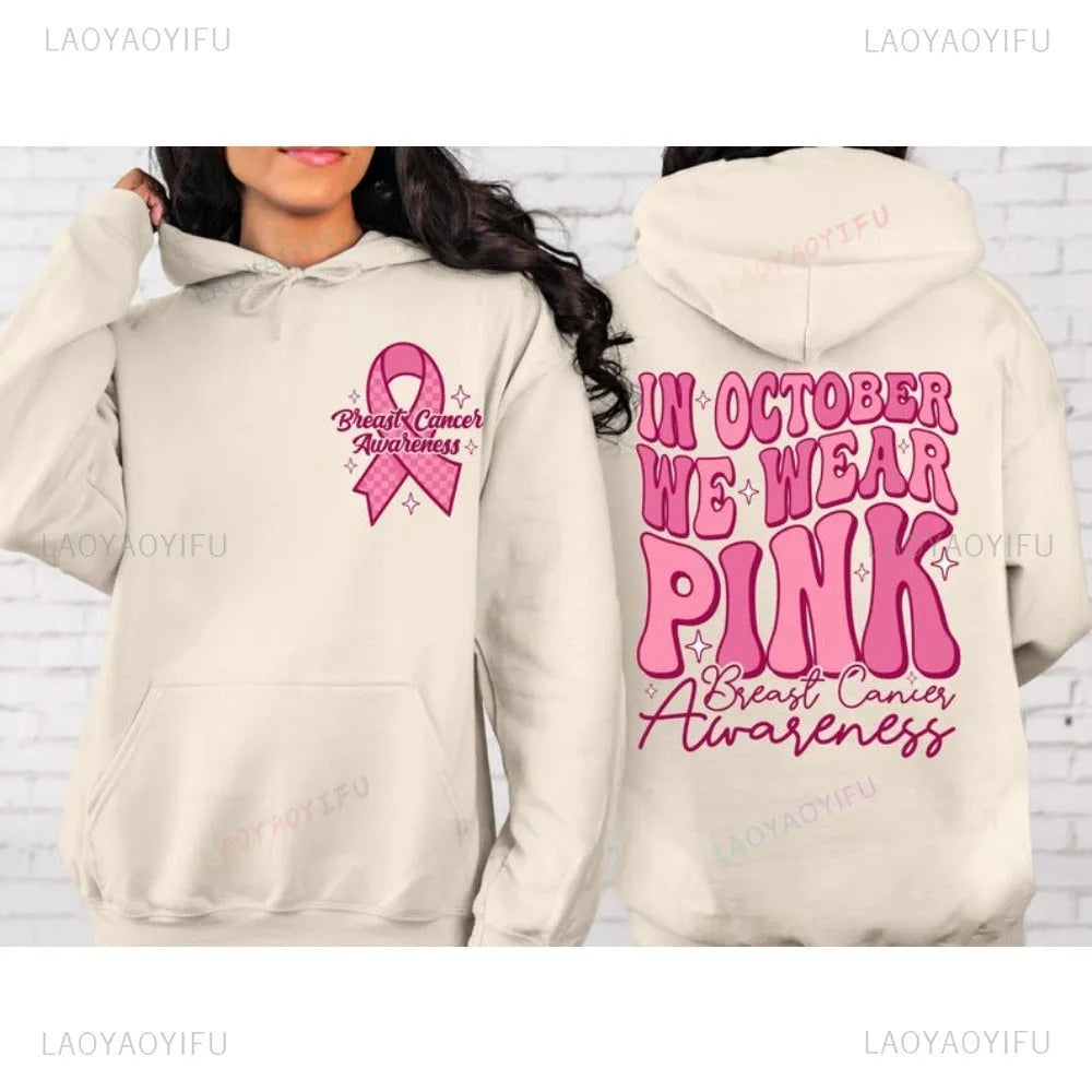 Breast cancer awareness pullover hoodie with retro art design and side seam pocket in pink colour.