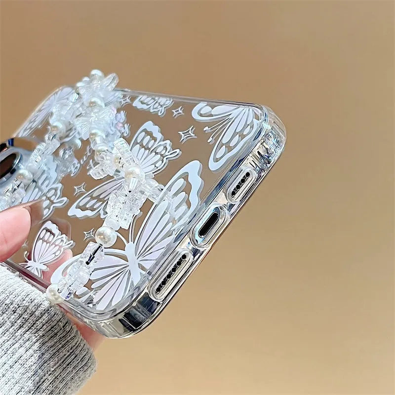 Clear iPhone 15 Pro Max case with 3-in-1 mirror and bow decoration on transparent TPU
