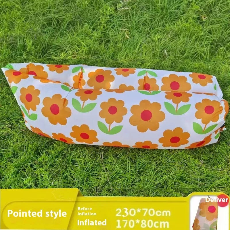 Inflatable lazy sofa in outdoor setting with colourful design options