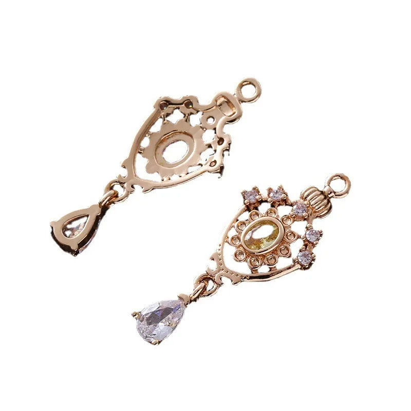Small crown hollow water drop pendant with micro inlaid zircon details in five colours.