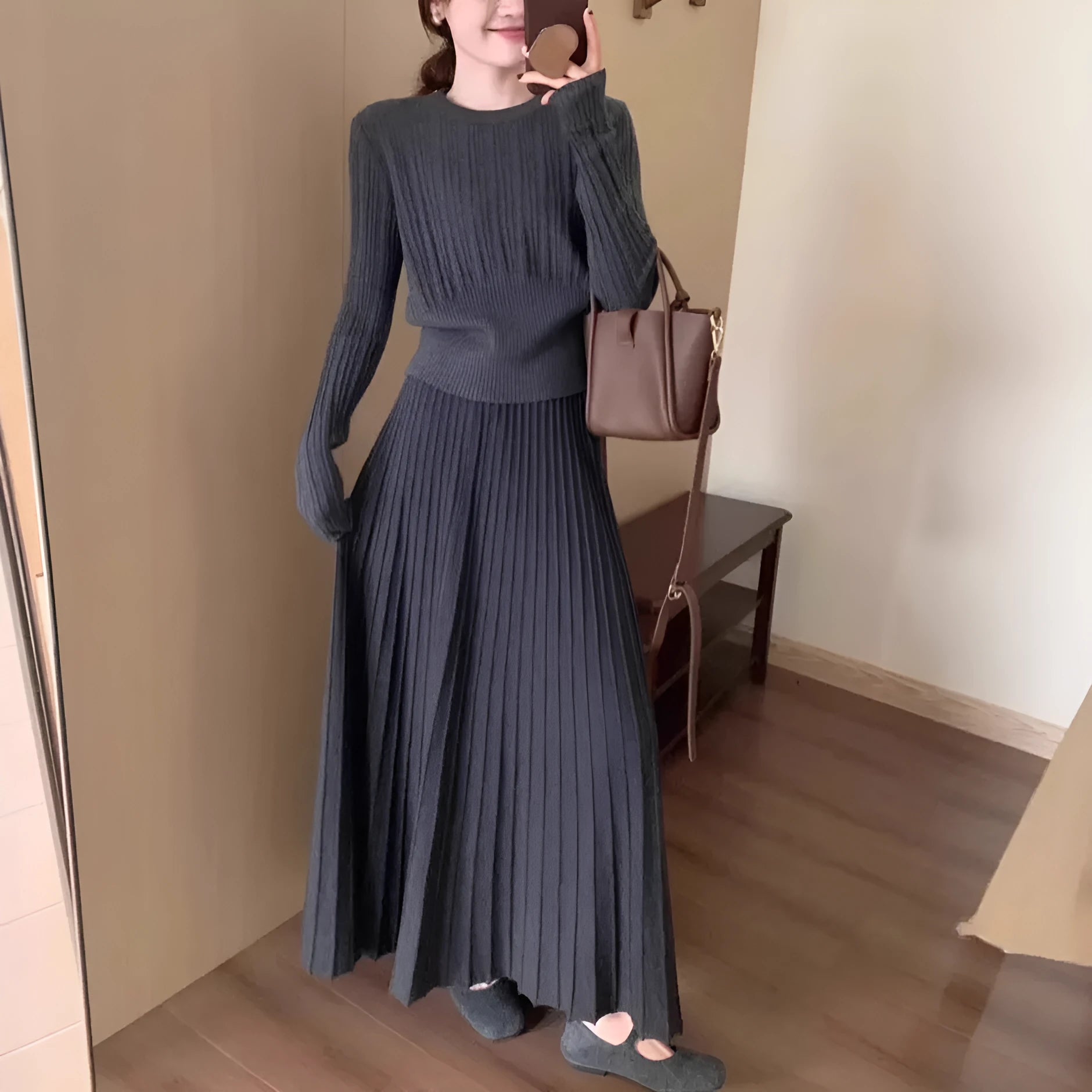 Dark grey knitted two-piece dress suit with 3D pattern, featuring a sweater and skirt in retro ethnic style.
