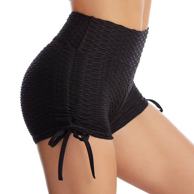Drawstring textured butt lift gym shorts in black with pocket for women