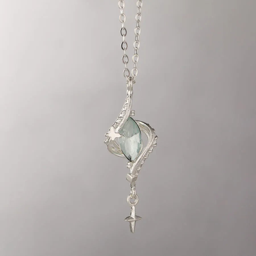 Hollow out Mori style winding pendant on an adjustable alloy cross chain necklace.