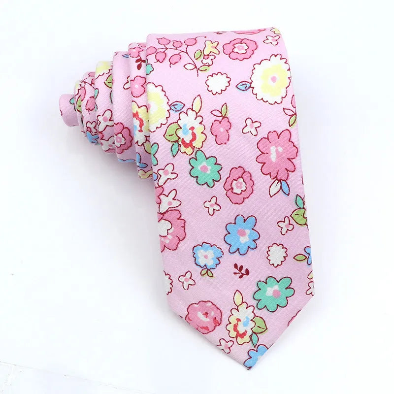 Narrow Korean style cotton bow tie with a printed cartoon pattern in various colours.