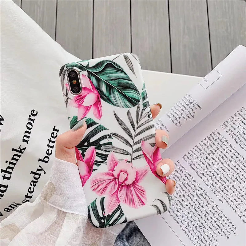 Pink floral pattern on a flexible TPU back cover case for iPhone.