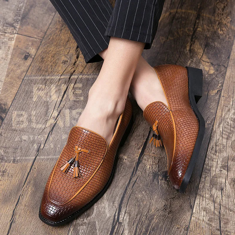 Men's black slip on loafers with pointed toe and tassel detail on PU leather upper