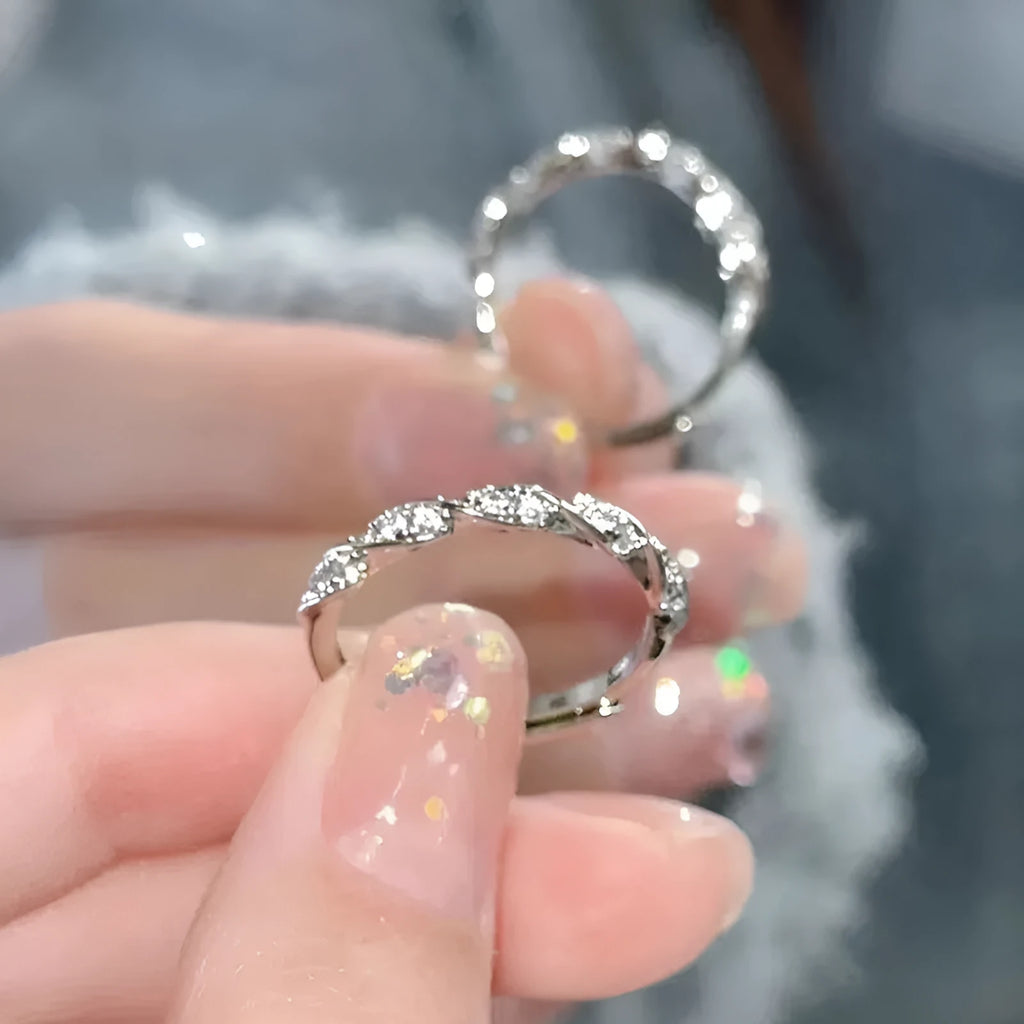 S999 sterling silver winding love ring in white gold colour with inlaid zircon for women