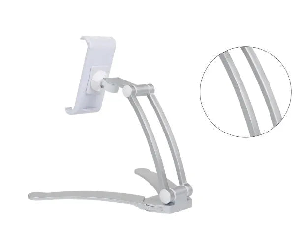 Silver aluminium alloy desktop tablet stand with adjustable holder and white mounting base on a wooden table.