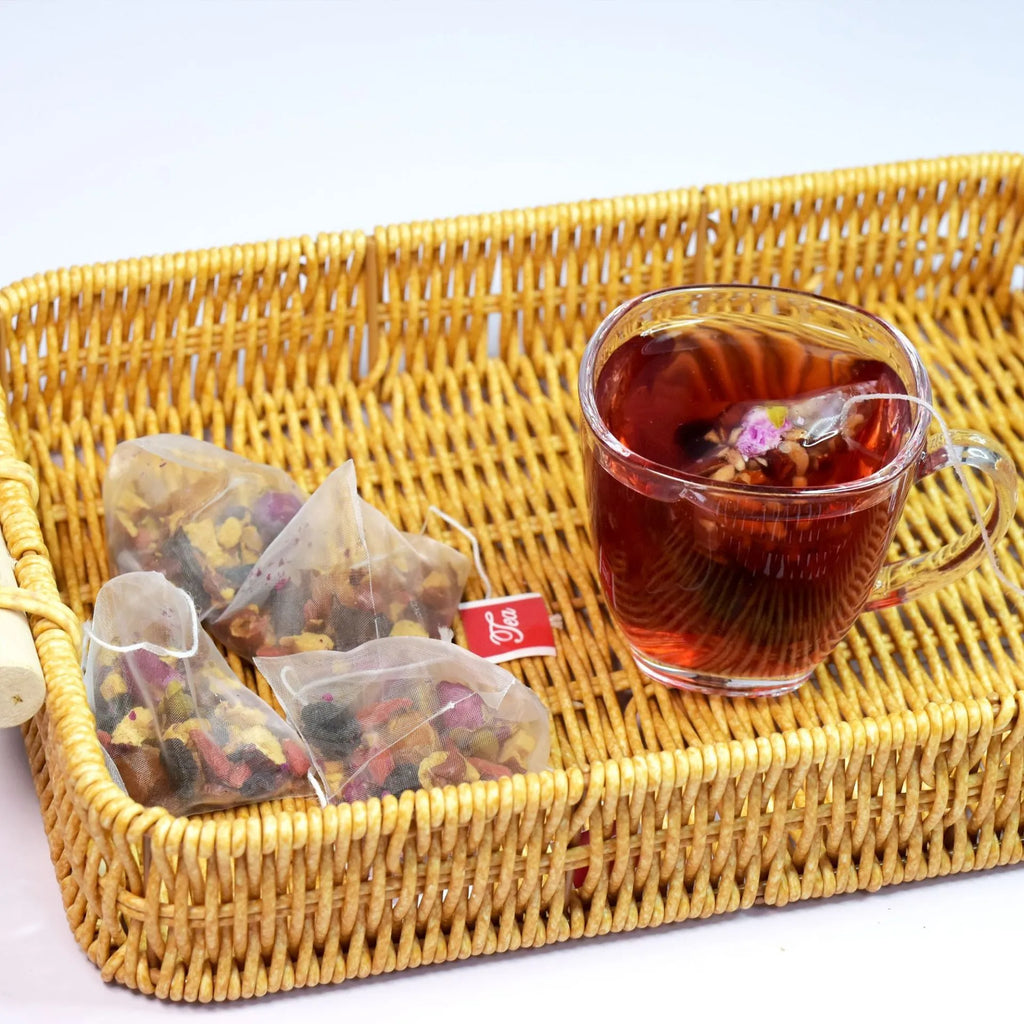 Women's menopausal health flower bag tea pack with 10 small bags on table