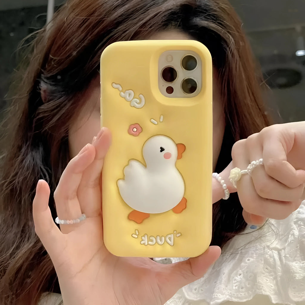 Yellow silicone phone case with three-dimensional cartoon duck for iPhone, featuring press pinch decompression element