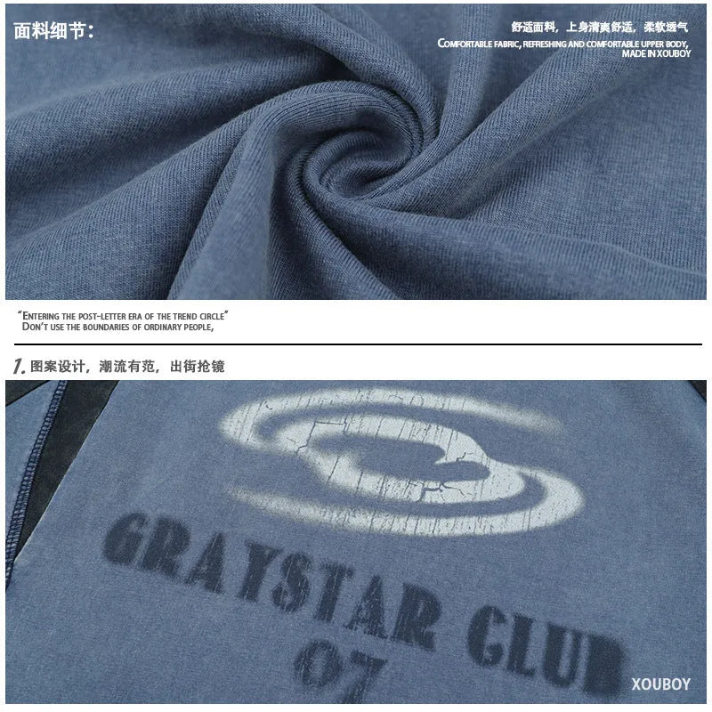 Men's blue hip hop t-shirt with white letter printing and raglan sleeves on hanger