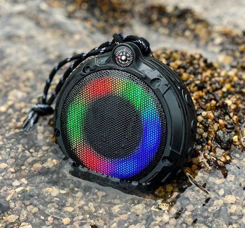 Compact black portable Bluetooth speaker with metal case and subwoofer, 99x104x41mm