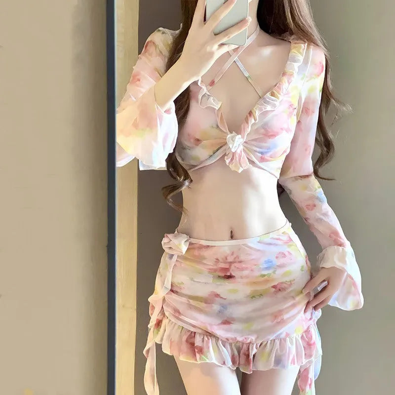 Women's floral pattern bikini swimsuit in cherry blossom pink colour.