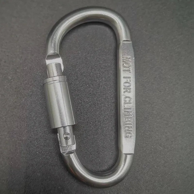 Silver D-shaped aluminium locking carabiner with an 8cm profile on a grey background.