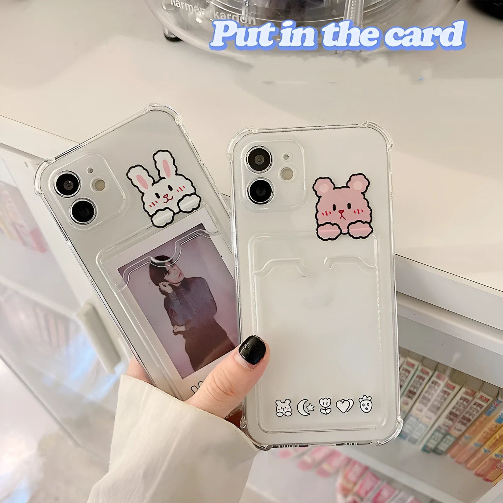 Cartoon design transparent TPU phone case with integrated card holder for Apple iPhone.