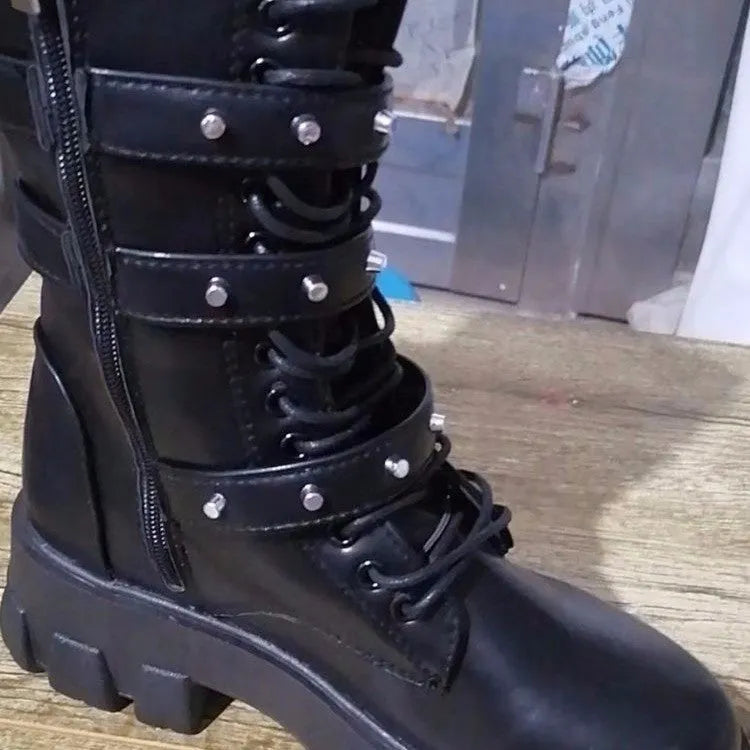 Women's black mid-calf knight boots with metal buckle detailing and side zipper