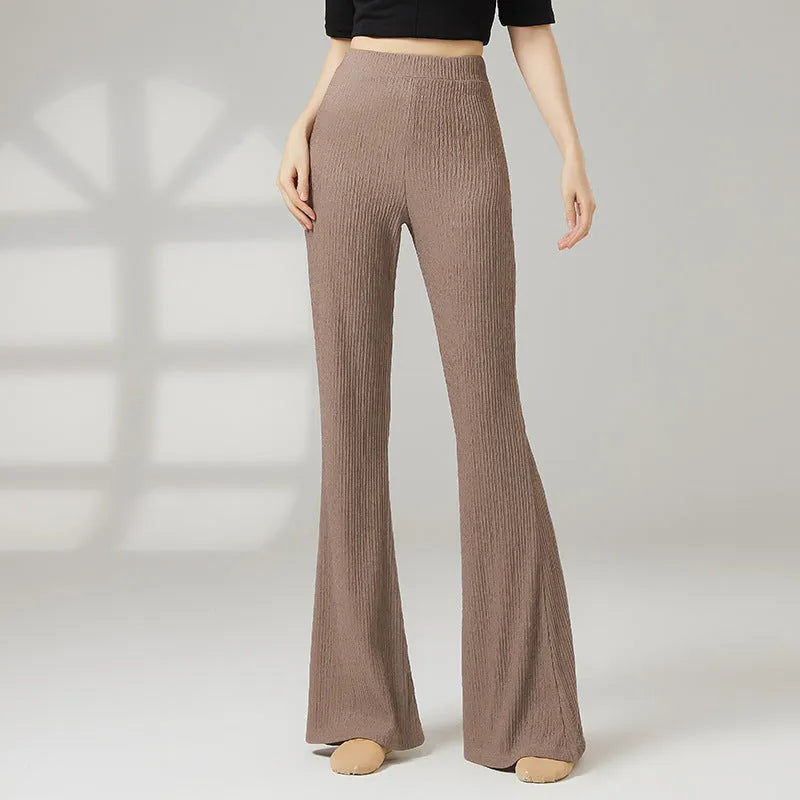 Women's solid colour polyester dance practice pants for classical ballet and body training.