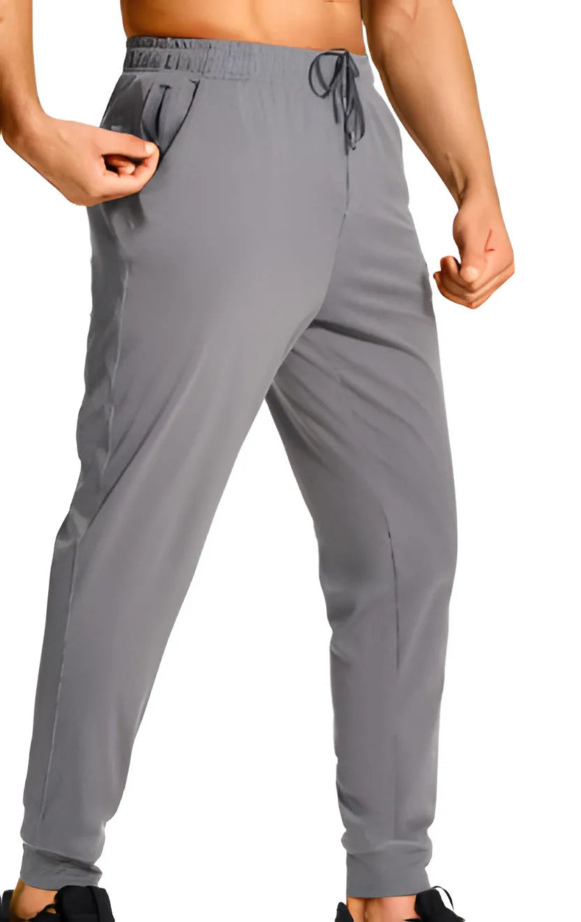 Men's loose casual trousers in polyester fabric available in multiple colours and sizes