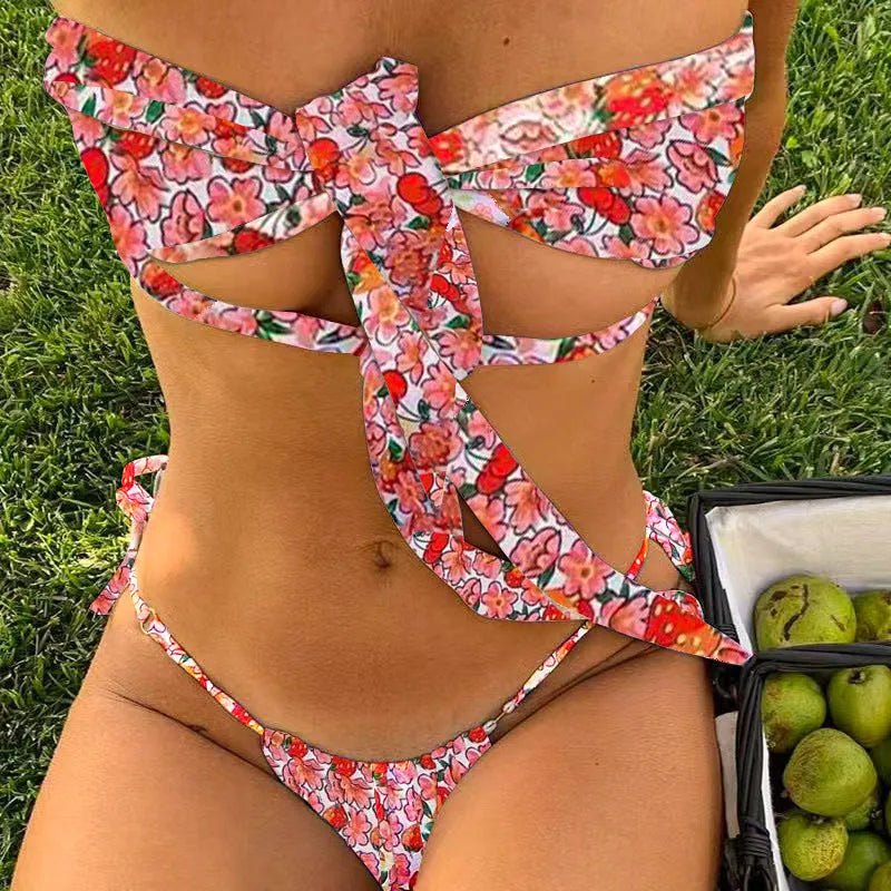 Women's floral print lace-up swimsuit with wireless cup and briefs style bottom.