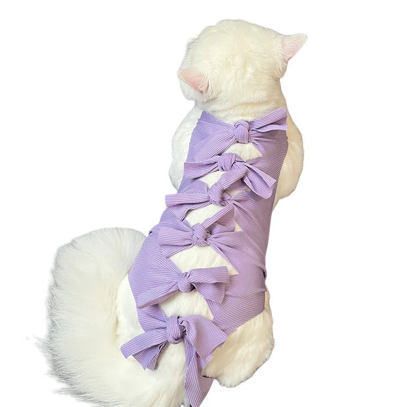 Blue lace-up polyester sterilisation clothing for a cat, shown on a size chart for S, M, and L.