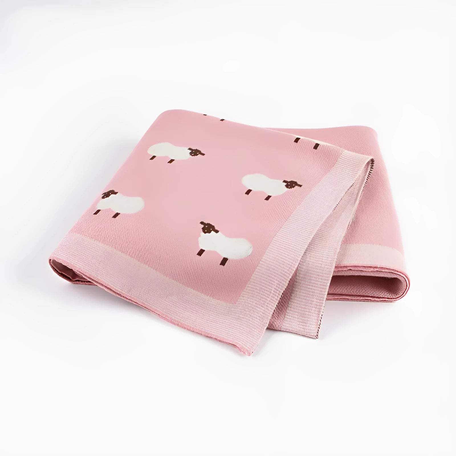 Soft pink baby blanket cover for a sheepskin, laid flat showing its rectangular 100cm by 80cm size.