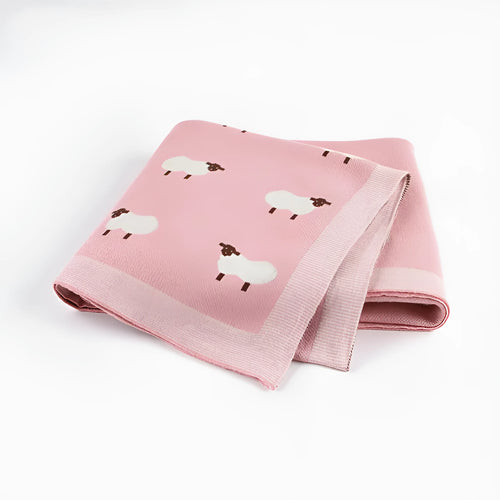 Soft pink baby blanket cover for a sheepskin, laid flat showing its rectangular 100cm by 80cm size.