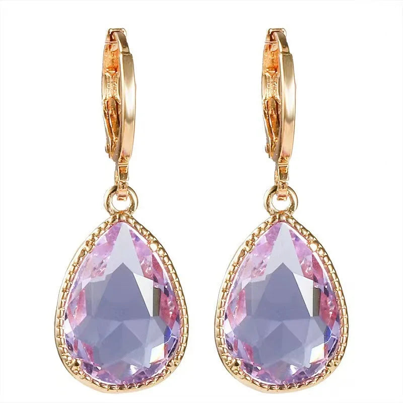 Geometric glass water drop earrings with carved Saturn design in multiple colours