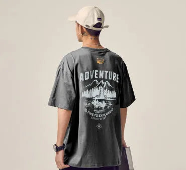 Men's black loose fit short-sleeved t-shirt on a hanger