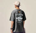 Men's black loose fit short-sleeved t-shirt on a hanger