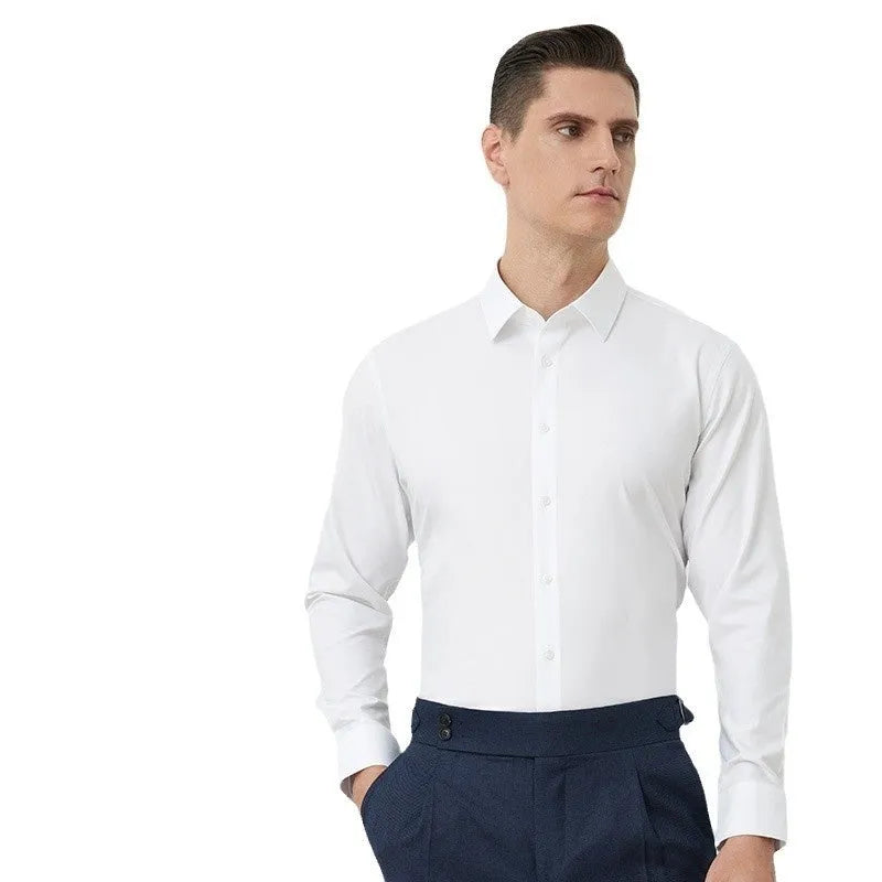 Man wearing a light blue long-sleeved non-iron business casual shirt with a regular fit.