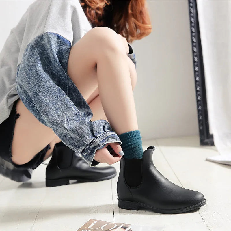 Women's PVC rain boots in black, Martin style with low tube and low heel design
