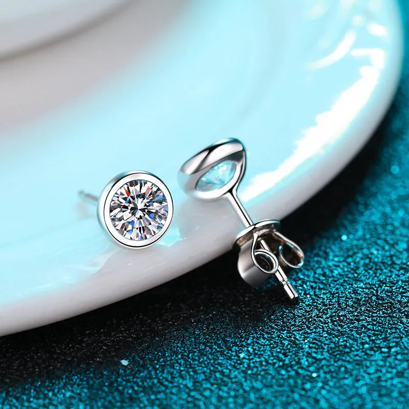 Geometric gold-plated sterling silver women's earrings with a moissanite or zircon centre stone.