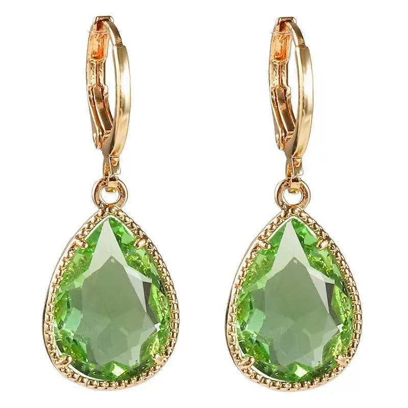 Geometric glass water drop earrings with carved Saturn design in multiple colours