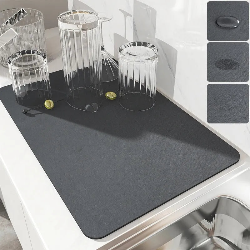 Black super absorbent square rubber drain pad mat on a kitchen countertop