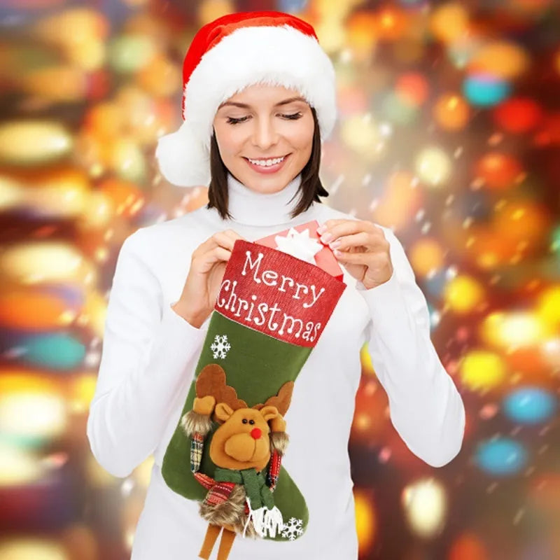 Three large Christmas stockings with Santa, Snowman and Reindeer 3D designs hanging for holiday decoration
