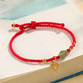 Handmade women's bracelet woven from 925 silver and red Hetian jade with carrying strap.