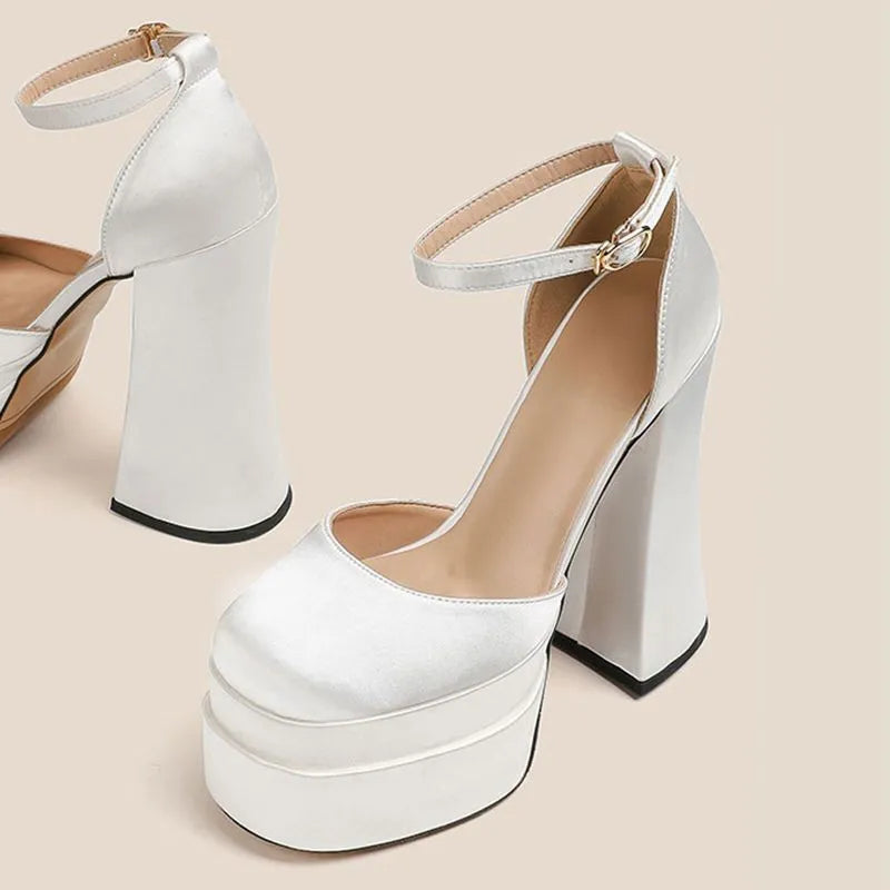 Women's white platform high heels with a chunky heel, round toe, and waterproof PU upper.