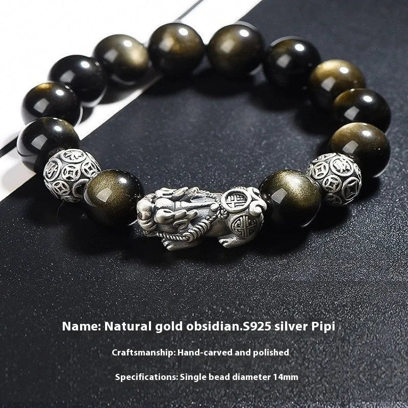 Men's geometric obsidian and sterling silver bracelet showing polished stones and metallic framework