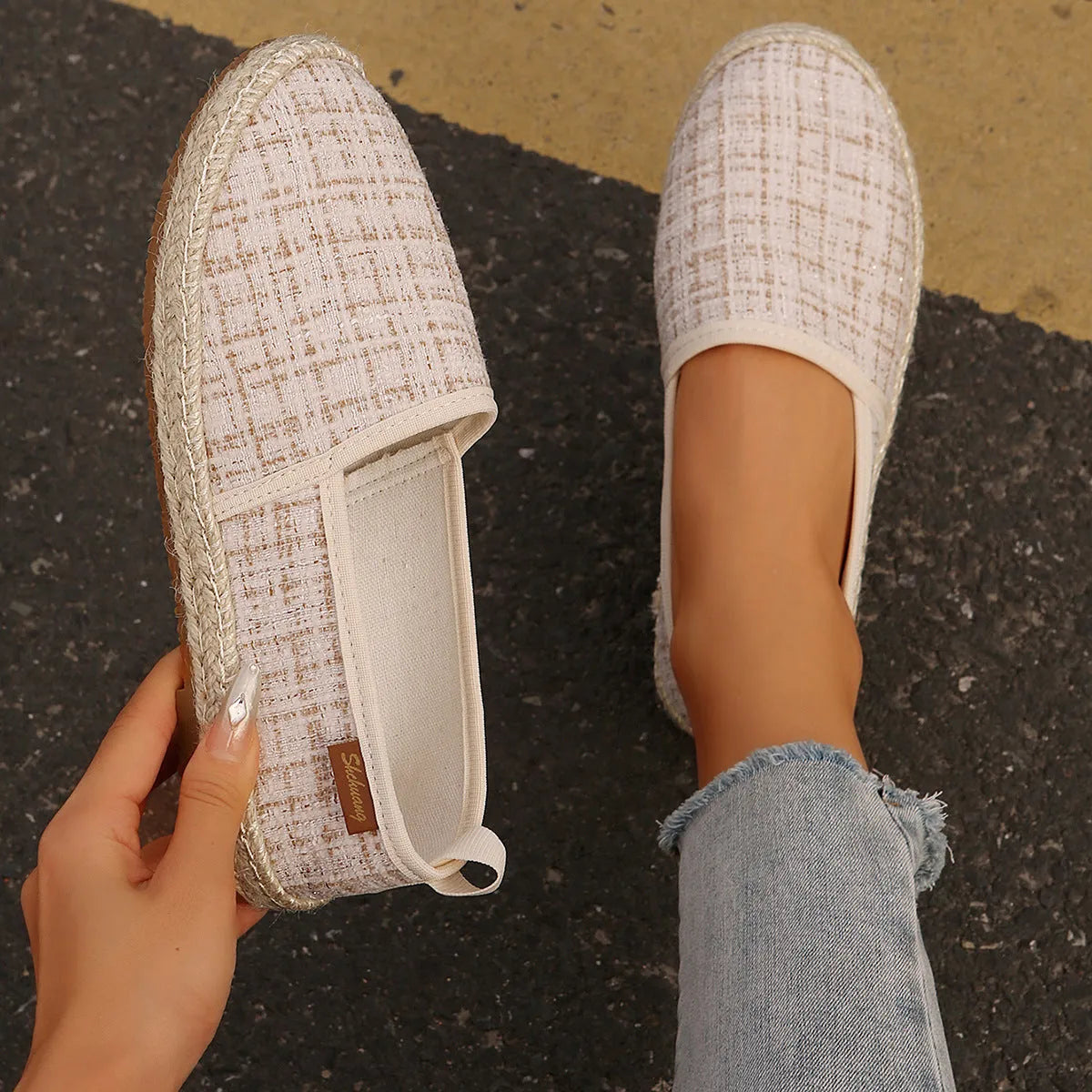 Beige rope sole fisherman shoes with canvas uppers and flat heels