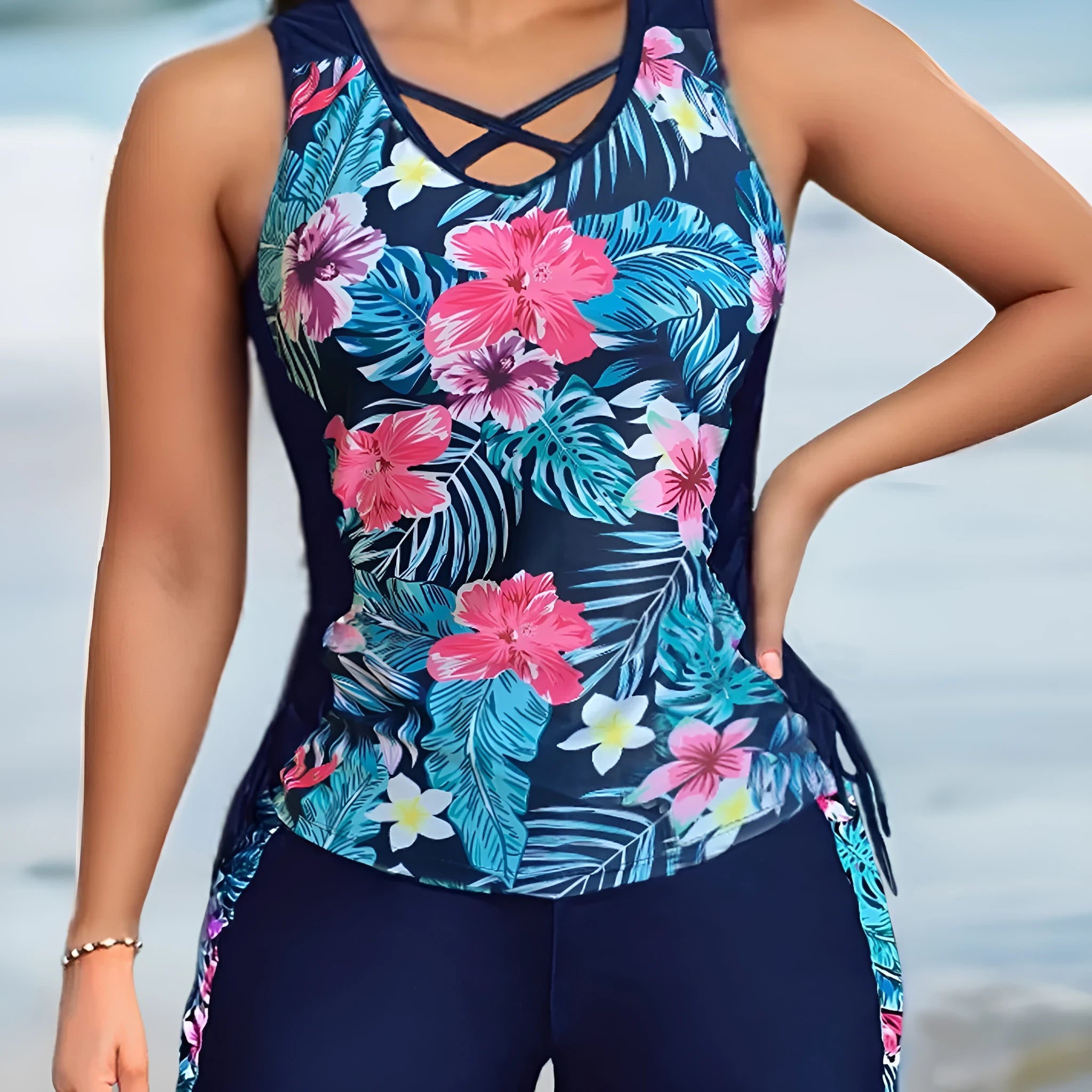 Plus size women's floral print bikini swimsuit with high waist briefs on a mannequin.
