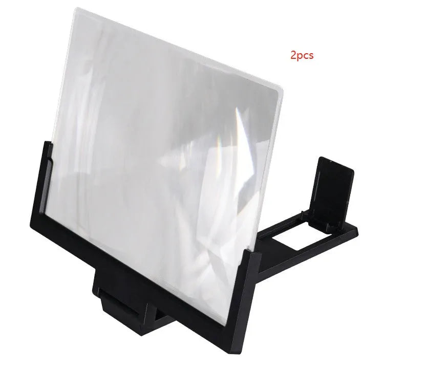 Mobile phone stand magnifier with black frame and clear acrylic screen showing magnification effect