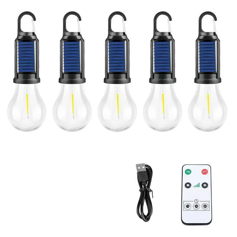 Five solar-powered garden lanterns with warm white LED light and pastoral style design