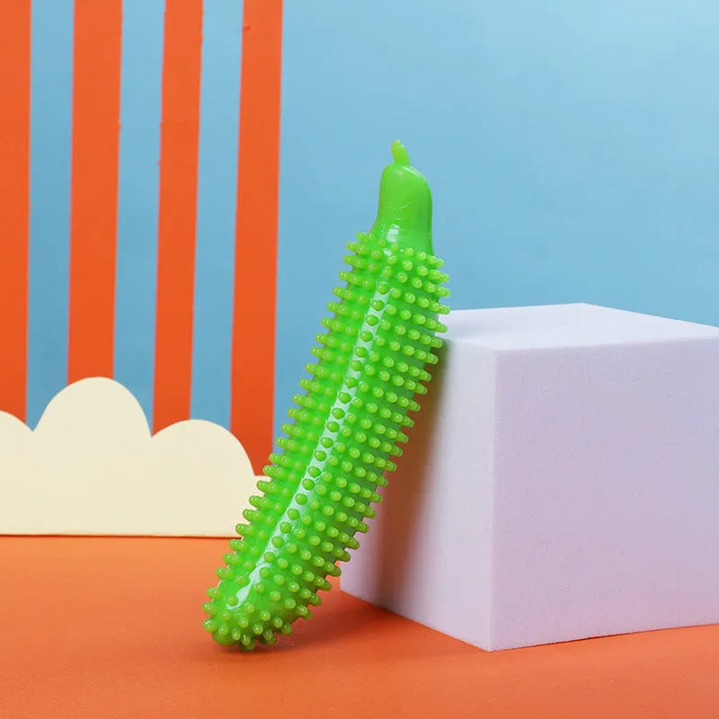 Cucumber-shaped dog teething toy in green, pink and purple colours for bite-resistant chewing and training