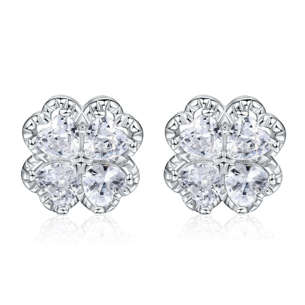 Pair of heart-shaped zircon earrings in 925 silver with a white gold finish.