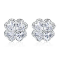 Pair of heart-shaped zircon earrings in 925 silver with a white gold finish.
