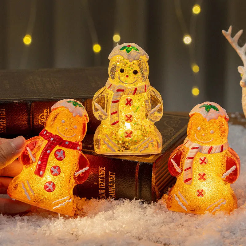 Glowing plastic gingerbread man snowman Christmas ornament with a choice of scarf colours on a festive background.