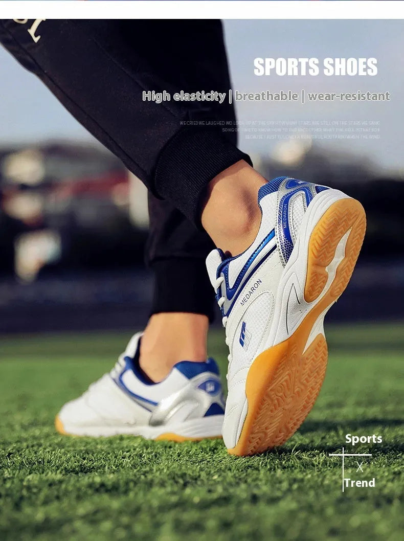 White and blue unisex table tennis training sneaker with lace-up front and rubber sole.