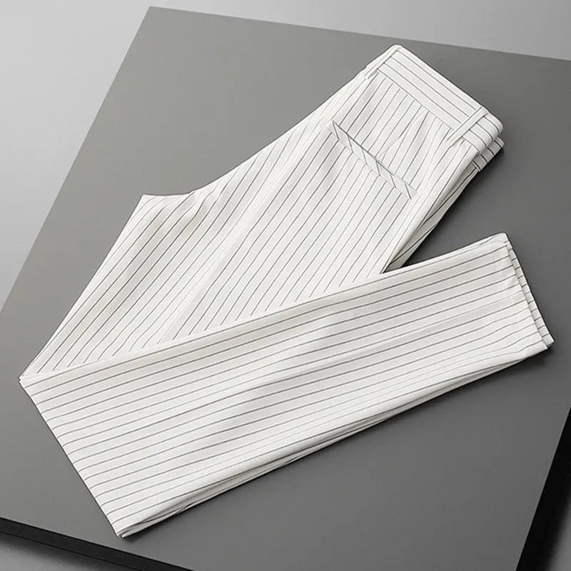 Men's thin striped loose suit pants in black and white, showing trousers style and crop jeans options