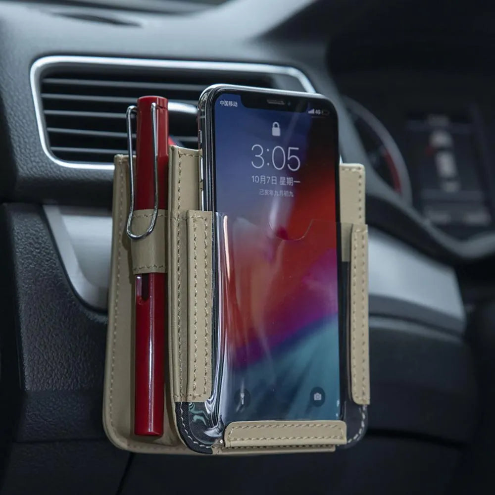 Beige faux leather car air outlet storage bag with clear phone pocket and multiple compartments for glasses, pen, and cords
